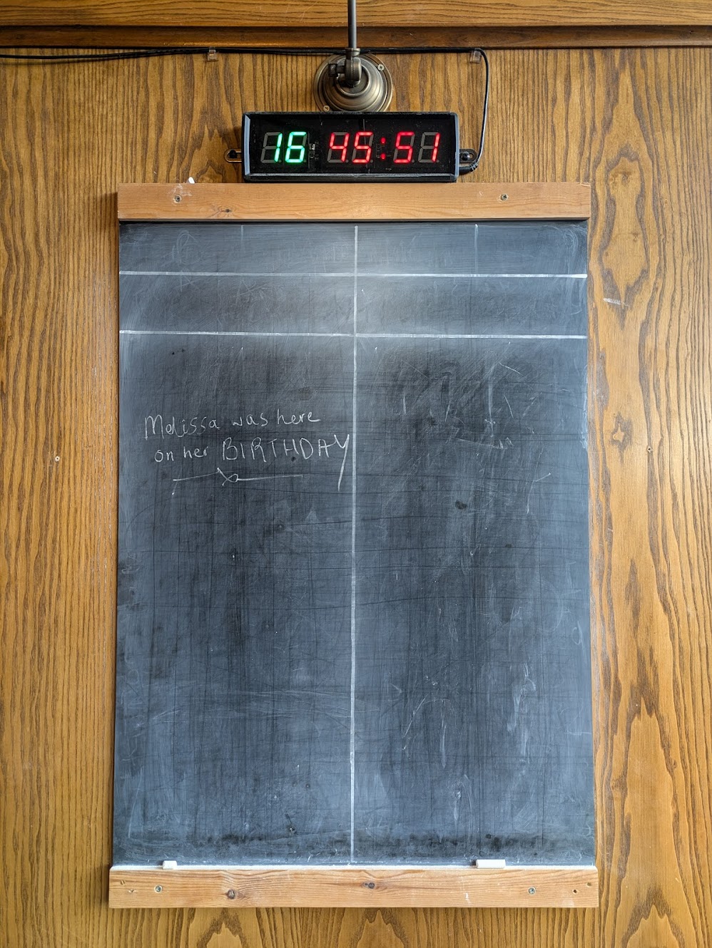 A picture of the chalkboard which says Melissa was here on her birthday