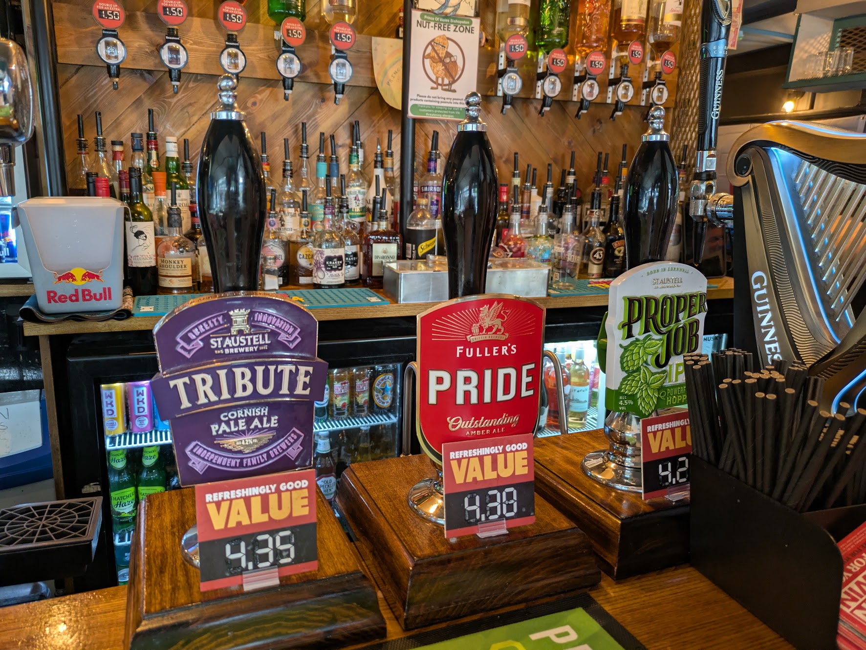 A picture of the cask beer pumps in the prince of wales