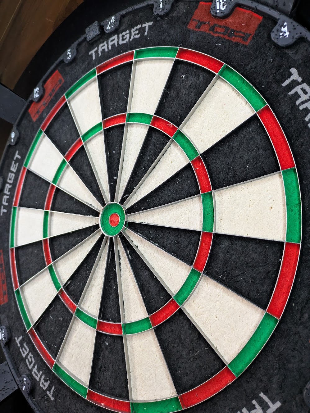an image from the side of the board showing the metal spider that separates the segments is mostly sticking out of the board