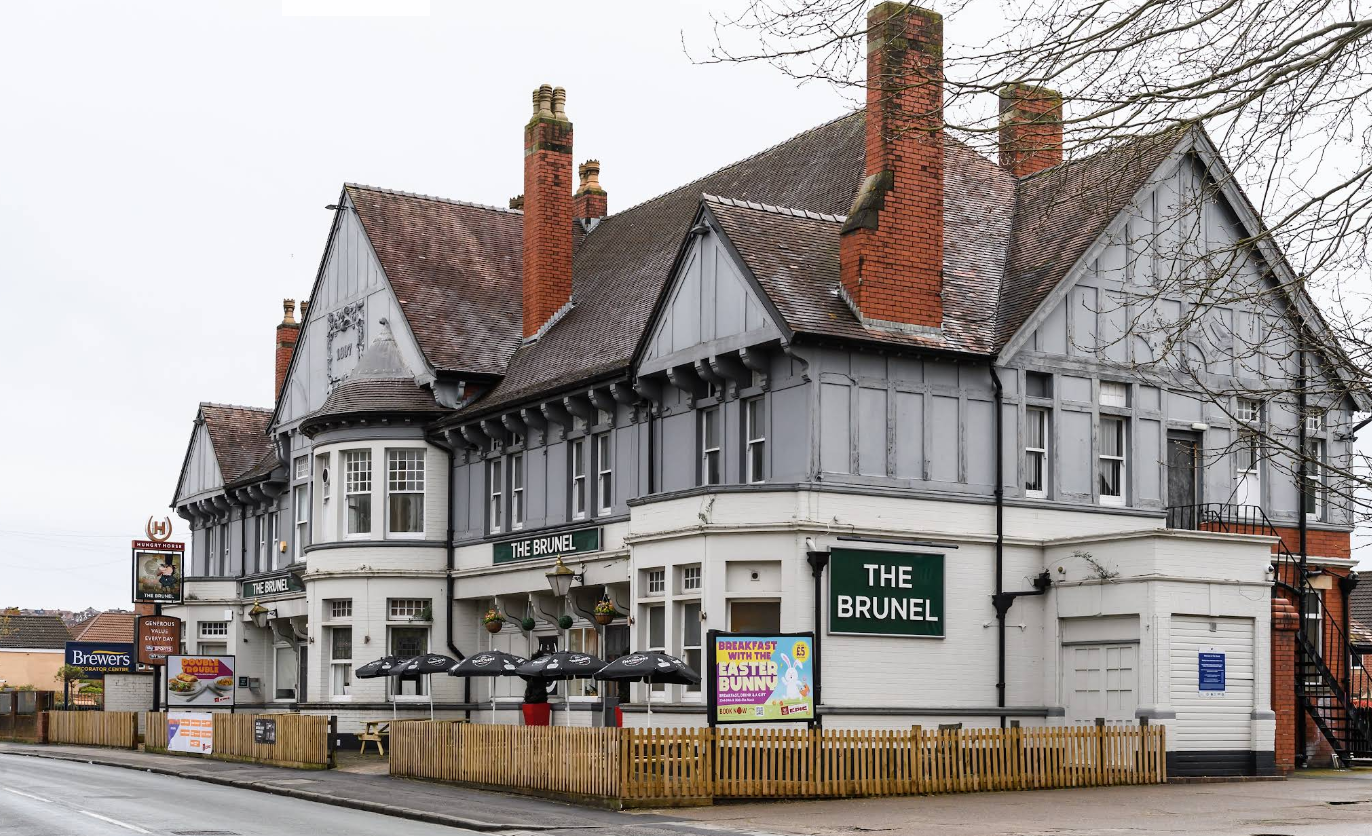 An exterior shot of the pub. Showing a very large building