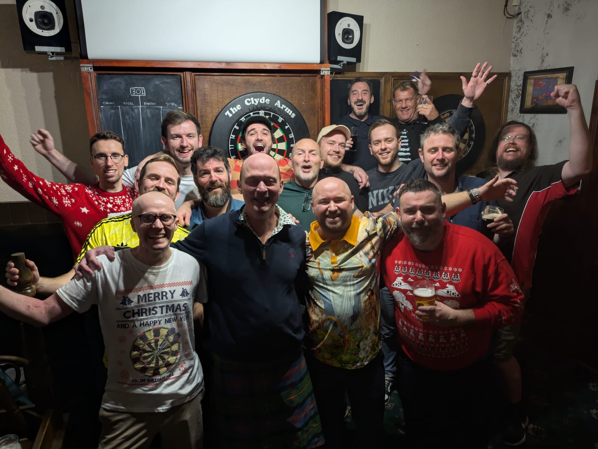 A group of blokes gathered for a group photo